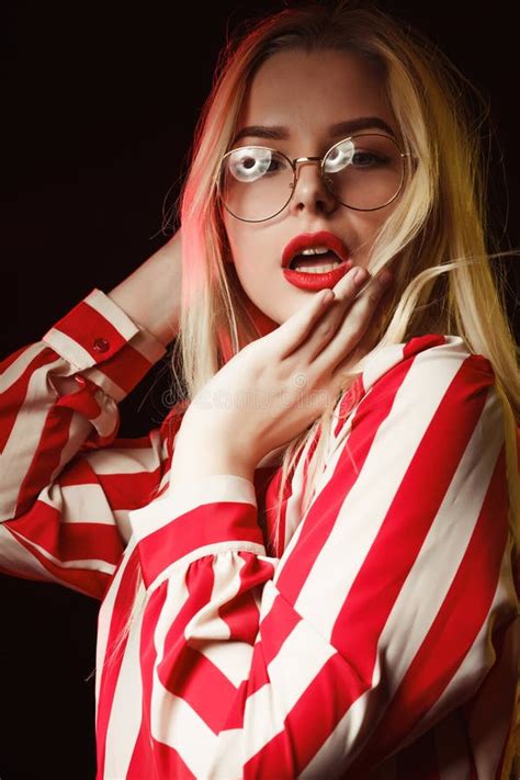 Gorgeous Blonde Girl In Glasses Wearing Striped Blouse Posing W Stock