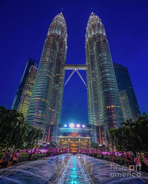 The petronas towers were the tallest buildings in the world for six years, until taipei 101 was completed in 2004. Twin Towers, Kuala Lumpur Photograph by Mark Lent