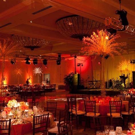 Catch rahmad mega at the orange ballroom 8th may 2016. Orange uplit wedding ballroom reception space with tall ...