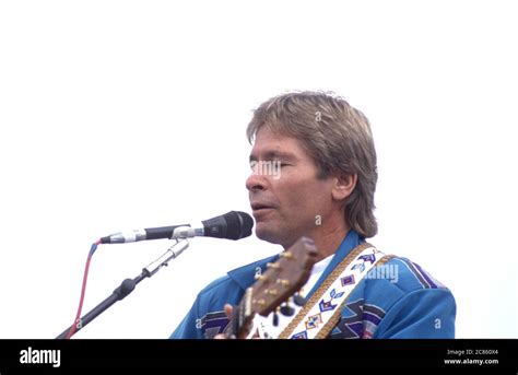 Singer John Denver Performs At An Earth Day Rally At The United States