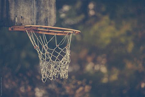 Old Basketball Hoop At An Abandoned Court By Stocksy Contributor Ron