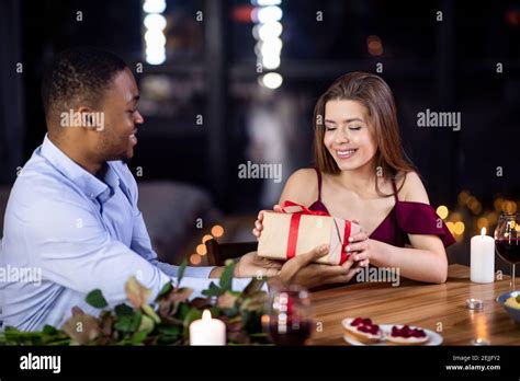 T With Love Affectionate African Guy Surprising His Girlfriend With Romantic Present Stock