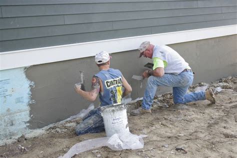 2 Rigid Insulation To The Concrete Foundation Wall Scratched Up Its