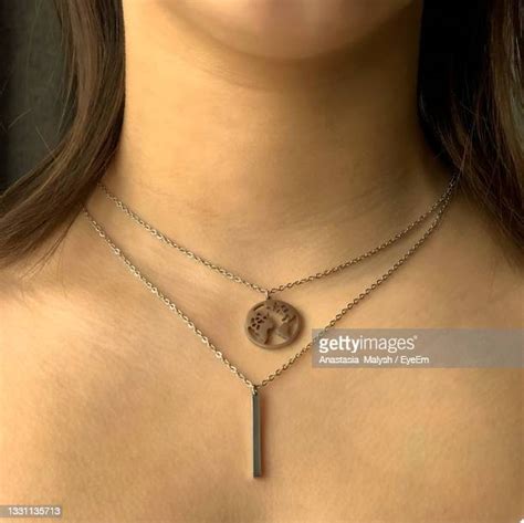 Chain Around Neck Photos And Premium High Res Pictures Getty Images