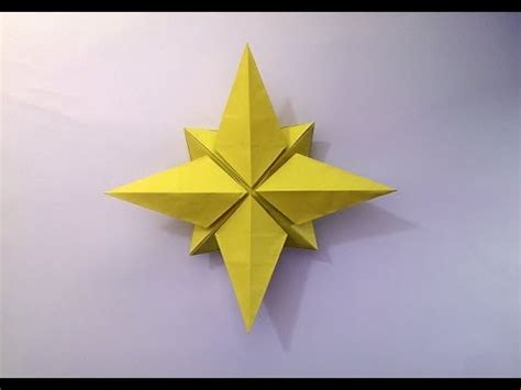 Learn how to fold a quick and simple origami paper star. How to make: Origami Christmas Star - YouTube