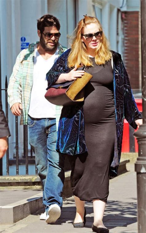 Pregnant Adele Shows Off Her Baby Bump In London Photos
