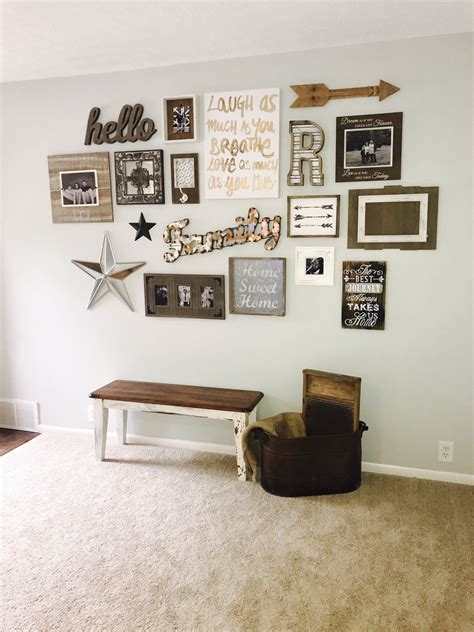 Finally finished my farmhouse style picture wall! Lots of hunting to ...