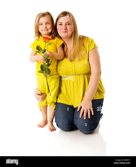 Mother And Daughter Posing Together Isolated On White Stock Photo Alamy