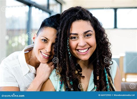 Smiling Lesbian Couple Relaxing On Sofa Stock Image Image Of Casual Adult 66972993