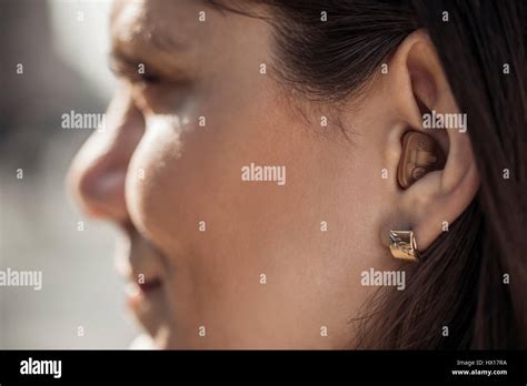 Young Woman With Hearing Aid Close Up Stock Photo Alamy