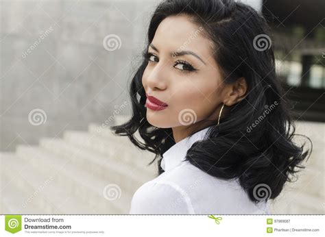 Woman Walking Outdoors Turning Head Stock Image Image Of Books