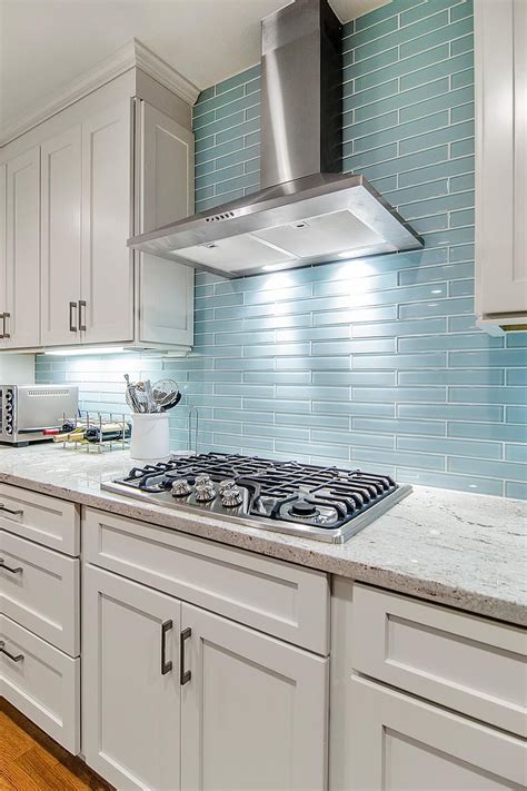 stainless steel cooktop and range hood with blue backsplash blue backsplash kitchen glass