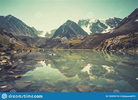 Altai Forest Reflect On The Lake Beautiful Landscape In Morning Time