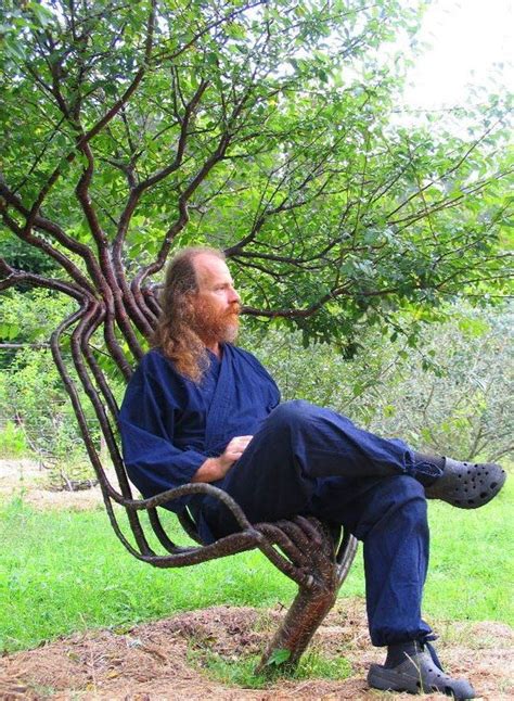 Artist Peter Cook Seated In His Living Garden Chair Read More About