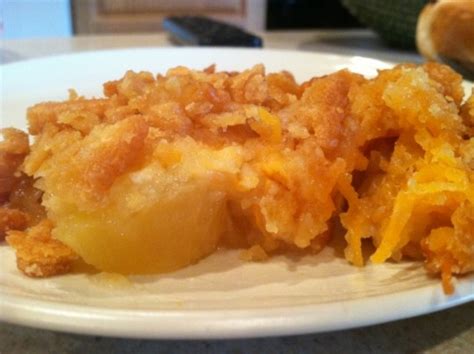 Bake for 60 to 70 minutes at 350º until golden on top and a knife inserted in the center comes out clean. Pineapple Casserole | Her View From Home