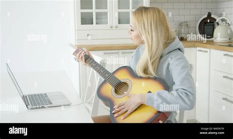 Woman Playing Electric Guitar Stock Photo Alamy