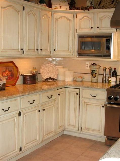 Notice that the original hardware, granite, mirror, sinks and plumbing fixtures remain. hand painted and distressed kitchen cabinets Similar to what we just did with… | DIY/Crafts in ...