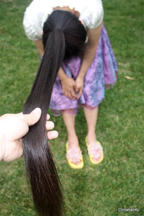 She has very long and thick hair.this video features her ponytail cut. Long hair, hair show, haircut, headshave video download