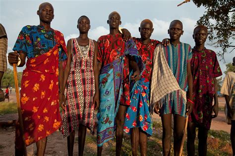 Portrait Of Dinka Tribesmen And Women At The Local Square In Rumbek