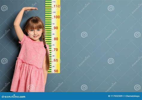 Little Girl Measuring Her Height Stock Image Image Of Child