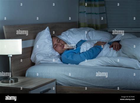Man Sleeping Bed Night Hi Res Stock Photography And Images Alamy