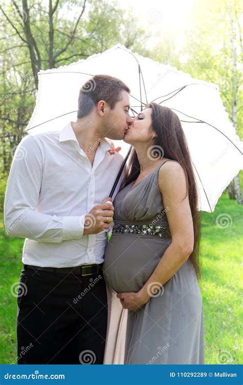 Couple Kissing Under The Umbrella Stock Image Image Of Beautiful