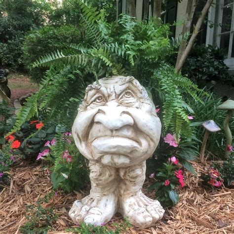 Use them in commercial designs under lifetime, perpetual & worldwide rights. Muggly's The Face Grumpy Statue | Garden statues, Amazing ...