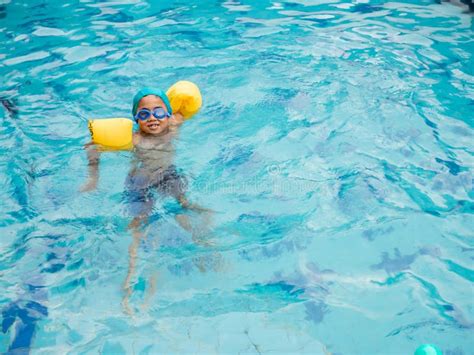 Boy Practicing Swimming In The Pool Stock Photo Image Of Learning