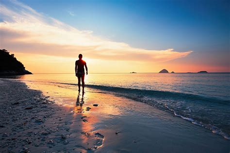 Contemplation On The Tropical Beach Lonely Man Walking On The