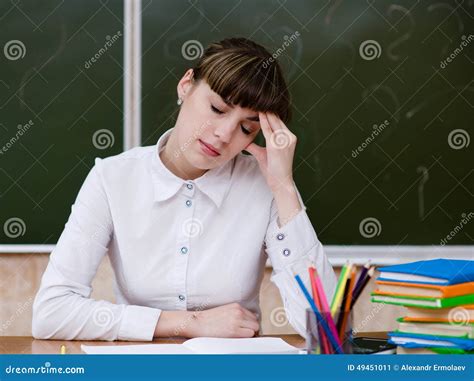 Tired Teacher In Classroom Stock Image Image Of People 49451011