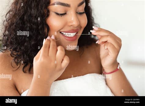 Oral Care Concept Young Black Plus Size Lady Using Dental Floss