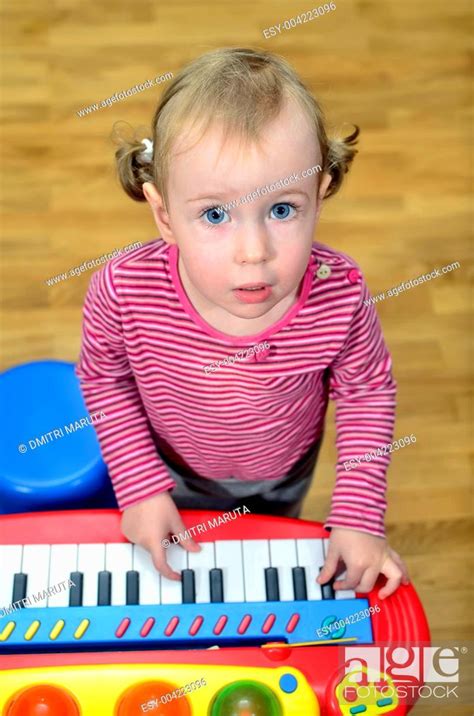 Little Girl Playing The Piano Stock Photo Picture And Low Budget