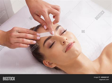 Beautician Removing Image And Photo Free Trial Bigstock