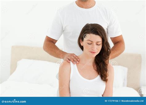 Attentive Man Doing A Back Massage To His Wife Royalty Free Stock Image Image 17279166