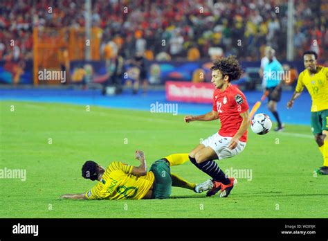 cairo egypt 6th july 2019 amr warda 22 of egypt in action with bongani zungu 8 of south