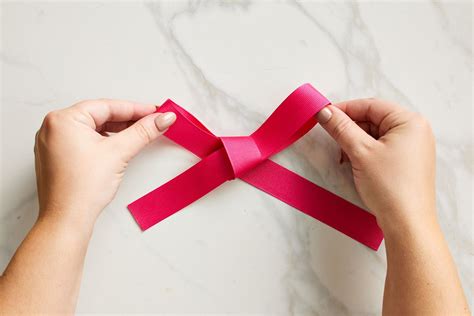 How To Make A Bow Out Of Ribbon In 4 Easy Steps Better Homes And Gardens