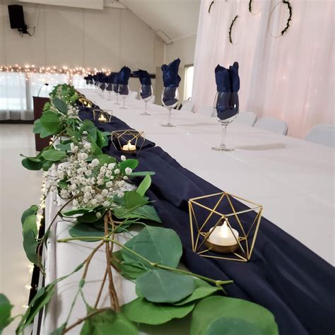 Navy Blue Chiffon Wedding Head Table With Eucalyptus And God Geo Head