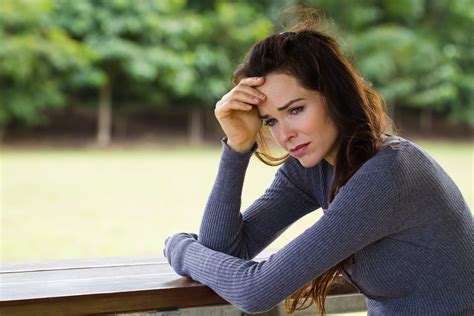 Sad And Worried Woman Sitting Outdoors Before I Go Solutions