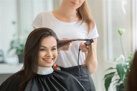 Young Women Sitting In Beauty Hair Salon Style Stock Photo Image Of