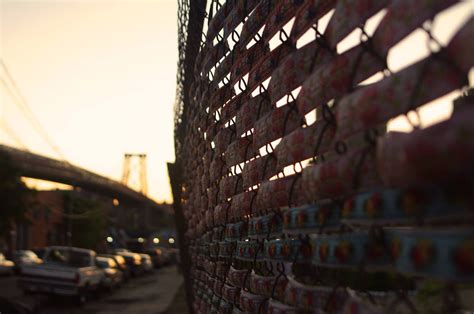 Hand Woven Chain Link Fence And Williamsburg Bridge In Brooklyn
