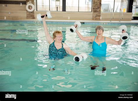 Two Senior Women Exercising Doing Water Aerobics Stock Photo Alamy
