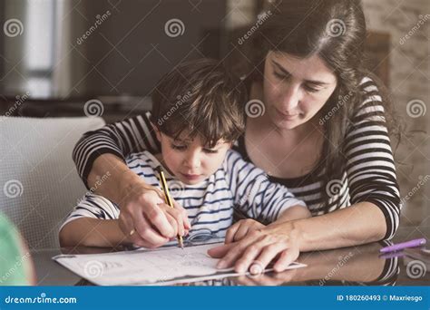Mother Helping Son Doing Homework Stock Image Image Of Hand Home
