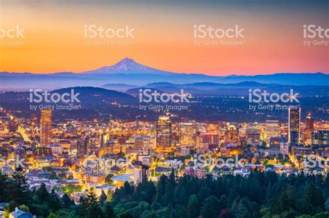 Portland Oregon Usa Skyline At Dusk With Mt Hood In The Distance