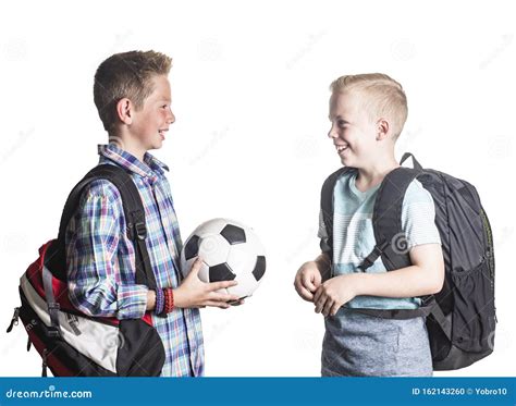 Two Smiling Boys Playing Together At School Two Friends Talking
