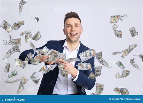 Happy Young Man With Money On Background Stock Photo Image Of