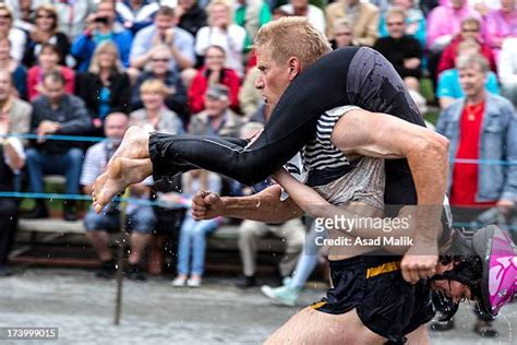Finland Wife Carrying Photos And Premium High Res Pictures Getty Images