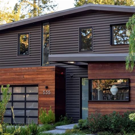 Instead, play with color and hardware for an entry that is functional and full of charm. Modern glass garage door adds sleek texture to home with ...