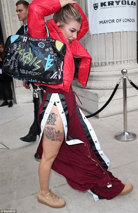 Olivia Buckland Flashes Her Leg Tattoos At Lfw Daily Mail Online