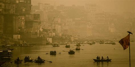 Varanasi At Sunrise With Boats On The Ganges River Northern India