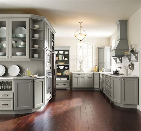 Mist on cabinets, let sit for a minute or two and then wipe clean with a soft cloth. Gray Kitchen Cabinets: Homecrest's Brenner features a beveld inside profile that soothes the ...